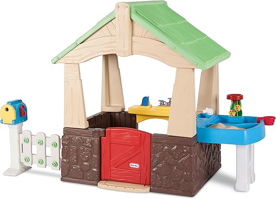 wooden playhouse with slide and sandpit