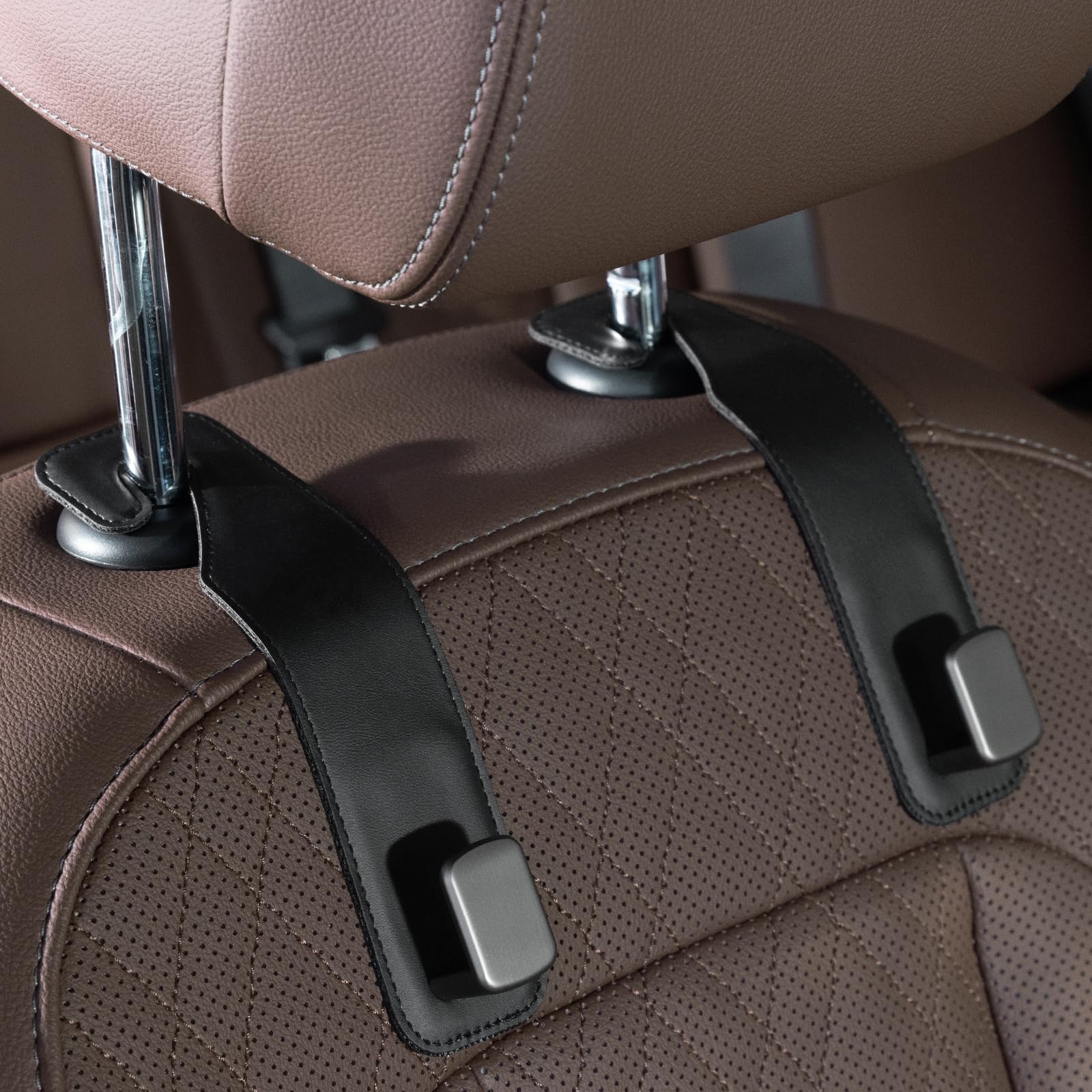 Photo 1 of CoBak Headrest Hooks for Car - Universal Premium Stitched Leather and Aluminum-Magnesium Alloy Single Car Seat Back Storage Hook for Purses, Handbags, Bags (2 Pack),Black
