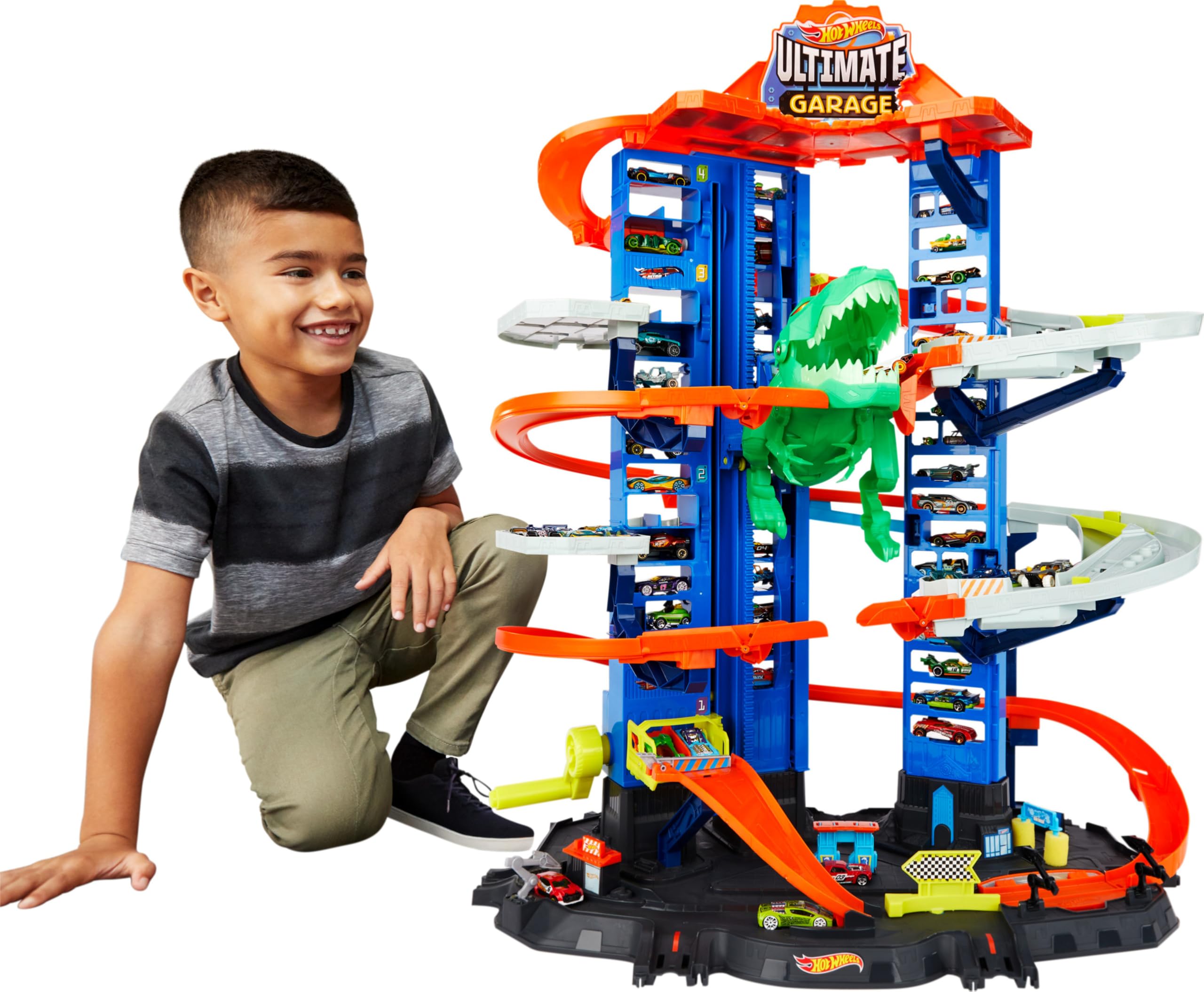 Photo 1 of Hot Wheels Ultimate Garage Track Set with 2 Toy Cars, Hot Wheels City Playset with Multi-Level Side-by-Side Racetrack, Moving T-Rex Dino & Storage for 100+ 1:64 Scale Vehicles (Amazon Exclusive)