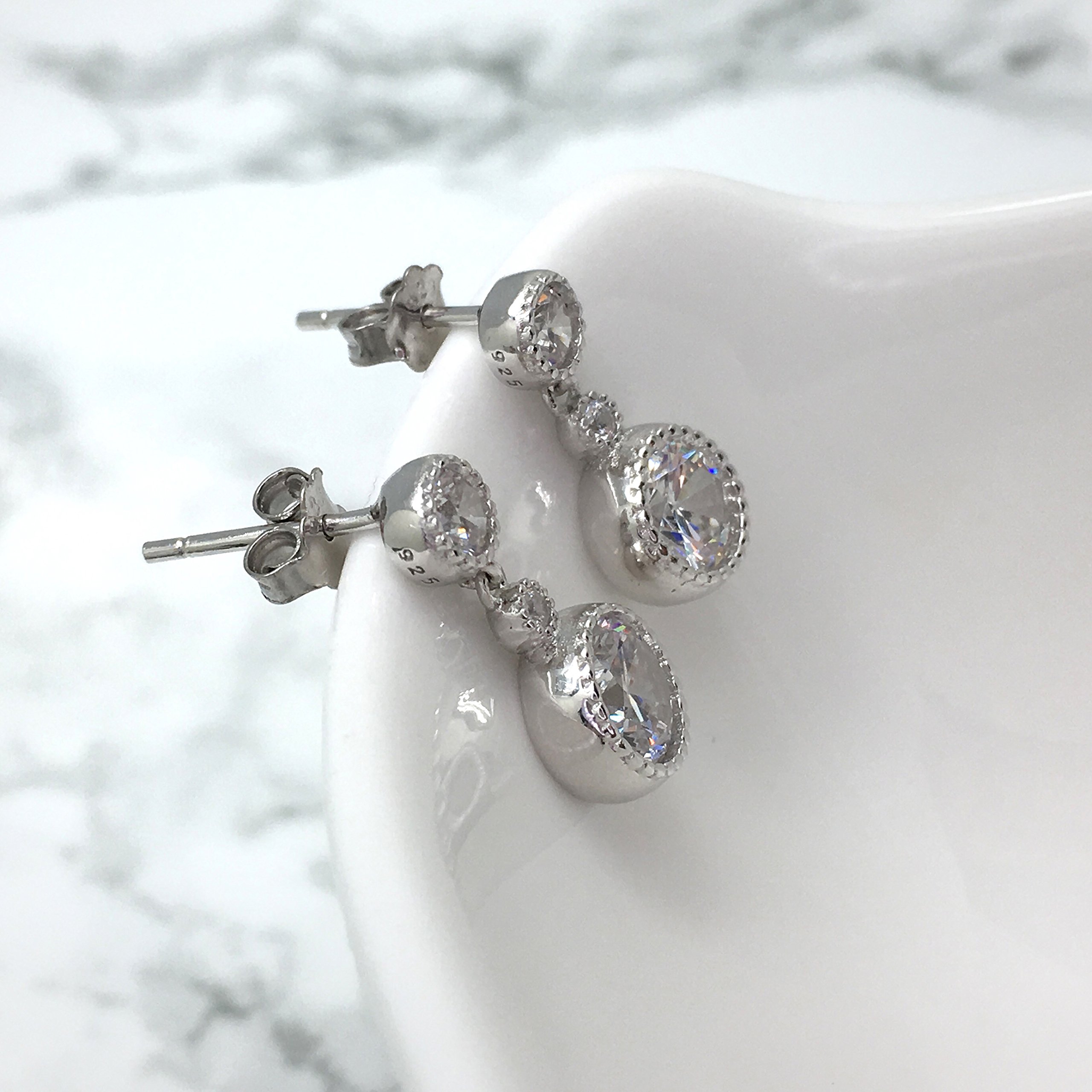 Spoil Cupid Rhodium Plated Sterling Silver Cubic Zirconia Milgrain Dangle Drop Earrings