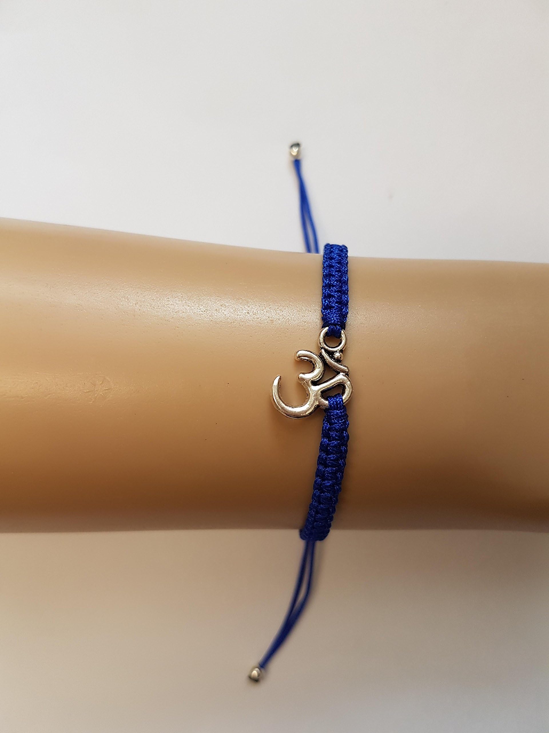 Om bracelet with blue cord