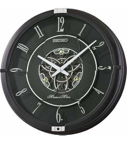 Amazon.com: SEIKO QXM611BLH 18 Melodies in Motion Rotating