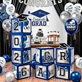 Graduation Decorations 2026 Navy Blue and Gold Balloon Boxes and Arch Garland Kit, Class of 2026 Congrats Grad Party Table Decorations with 4 String Lights, GRAD So Proud of You Letters
