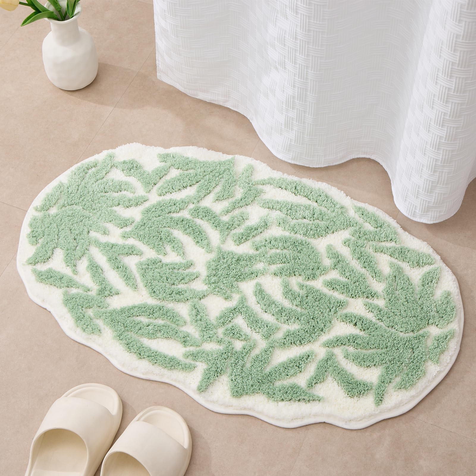 Photo 1 of ORTIGIA Cute Leaf Bath Mat, Green Leaves Bathroom Rug Soft Plush Microfiber Absorbent Quick Dry Non Slip Washable Bath Mats Floor Carpet for Shower Stall Bathtub Bedroom Sink Laundry Decor, 20x32
