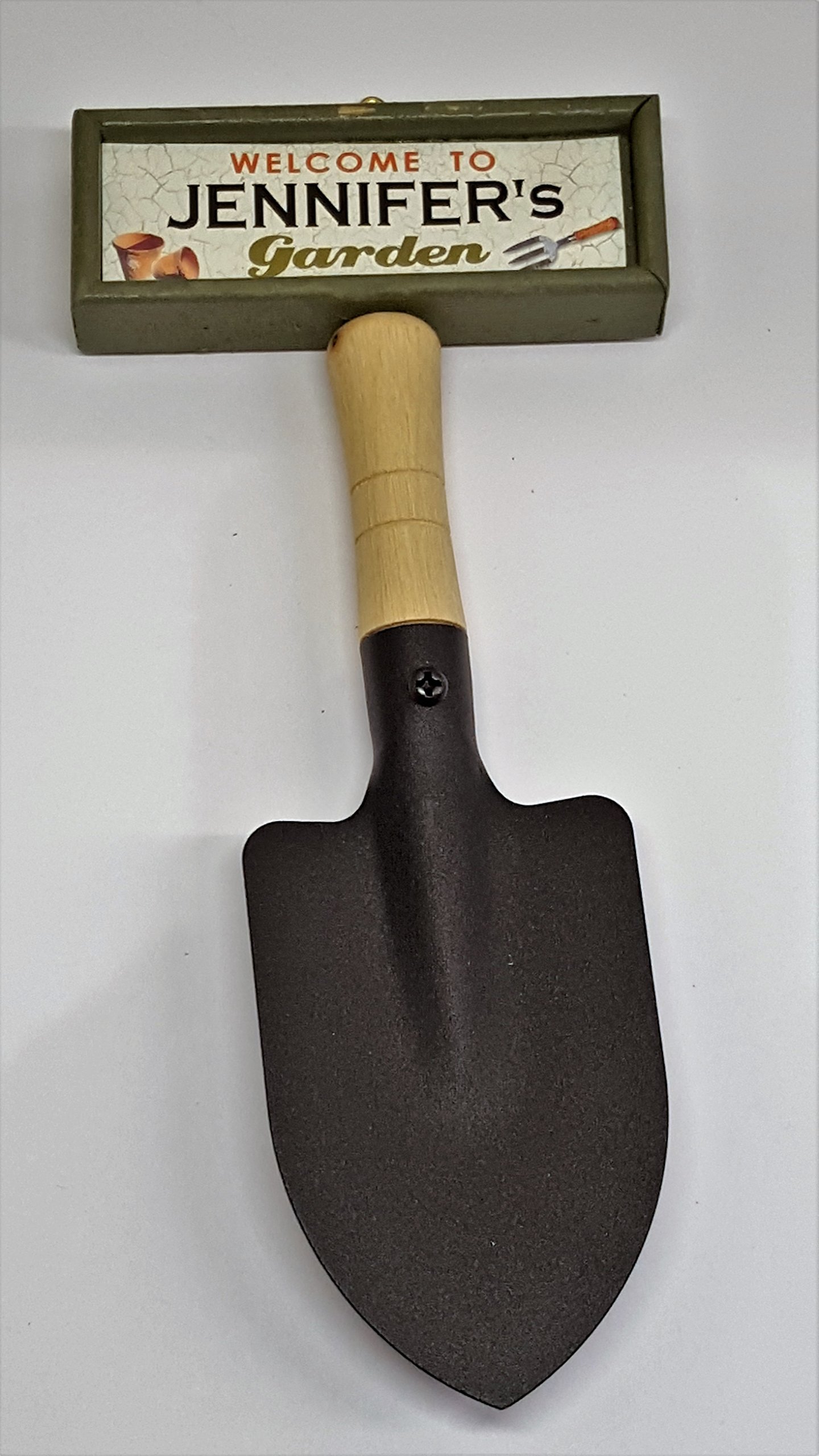 "Welcome to Jennifer's garden" hanging shovel sign