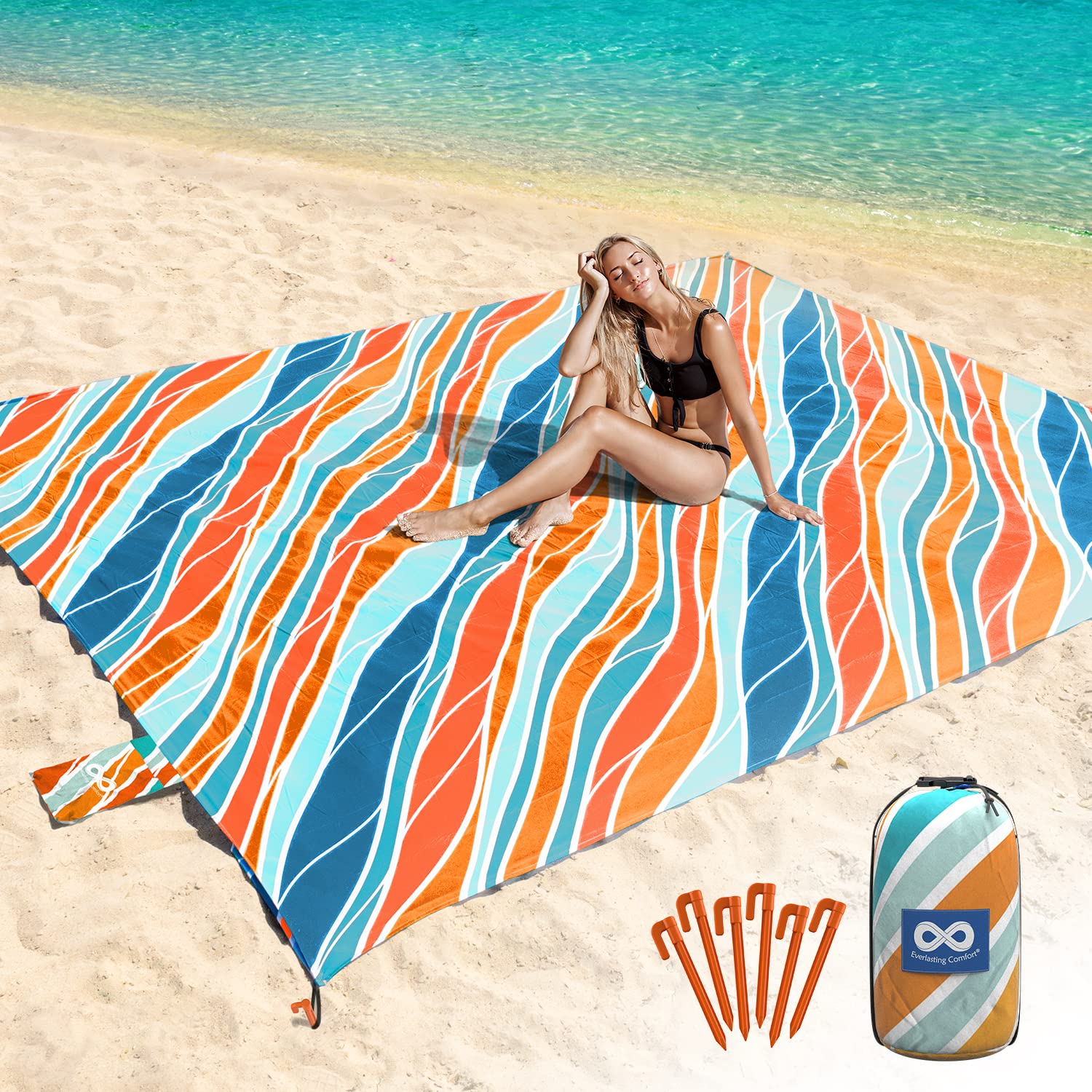 Photo 1 of Extra Large Beach Blanket Waterproof & Sandproof 9'x10'8" for 10 People - Beach Essentials for Family, Picnic, Concert, Travel - Includes 4 (+2) Stakes - by Everlasting Comfort