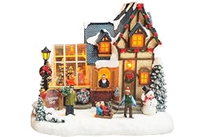 MOMENTS IN TIME Christmas Village Building Lighted Christmas Shop with LED Lights, Music & Snowman Battery Operated or Plug-in Vintage Holiday Village House Décor 8.5”H x 9.8”W x 6.9”D