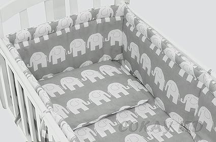 grey swinging crib