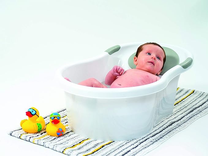 nuby baby bath with built in seat and soft headrest