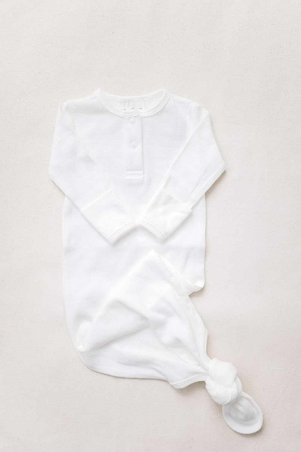 white newborn gown
