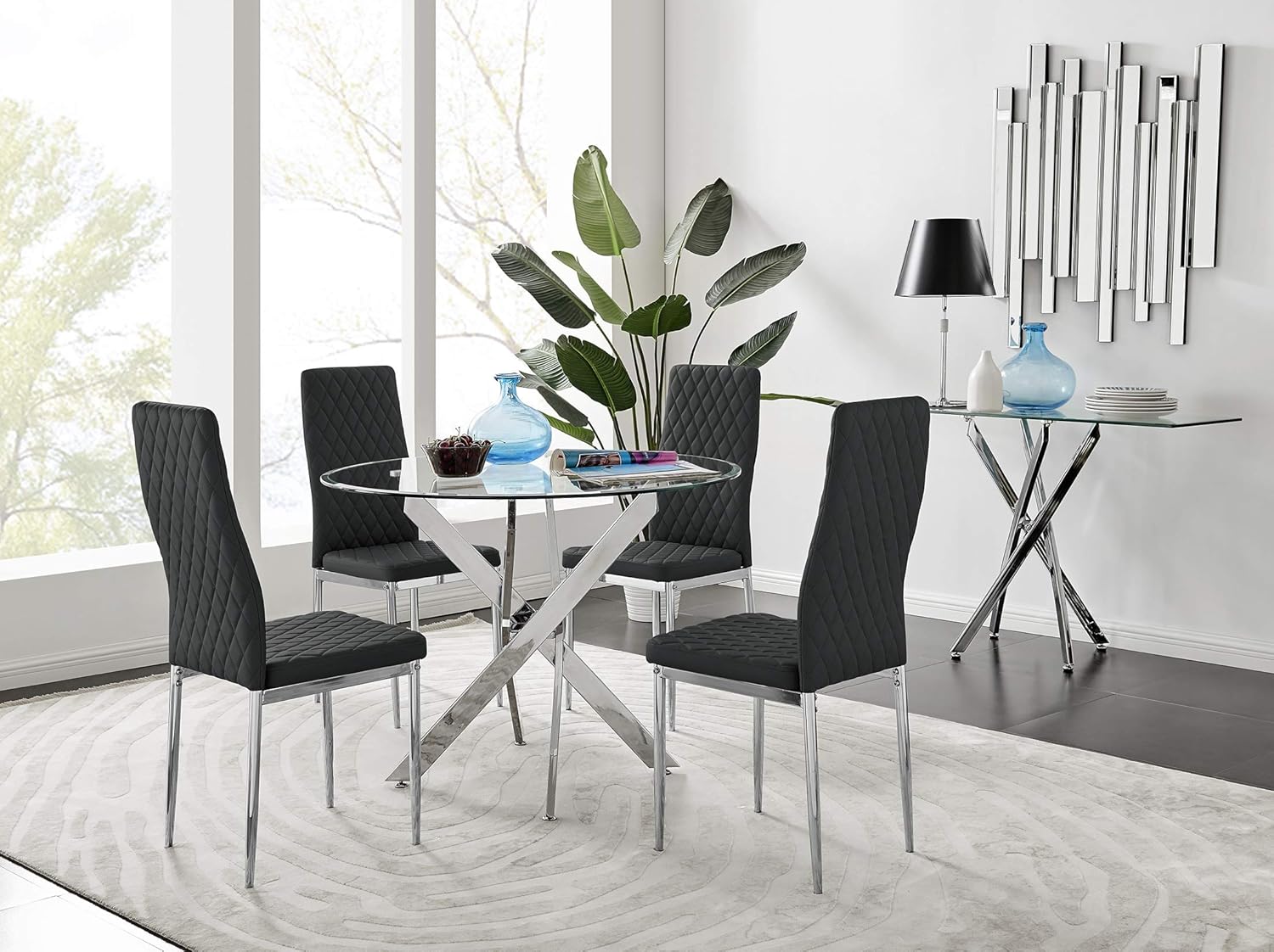 Furniturebox UK Novara Modern Round Chrome Metal And Clear Glass Dining Table And 4 Stylish Milan Dining Chairs Set Dining Table 4 Black Milan Chairs Amazoncouk Kitchen Home