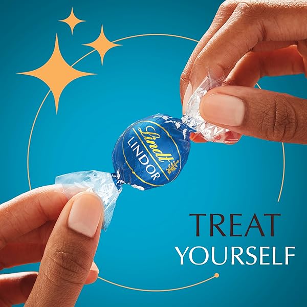 LINDT LINDOR SEA SALT MILK CHOCOLATE TRUFFLES, MILK CHOCOLATE CANDY WITH SMOOTH, MELTING TRUFFLE CENTER, GREAT FOR GIFT GIVING, 25.4 OZ, 60 COUNT BOX