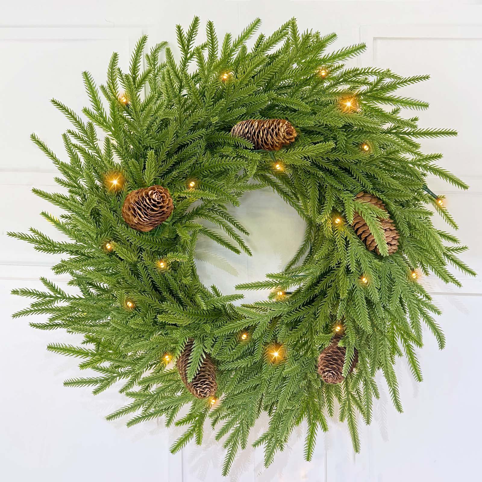Photo 1 of Thick & Lush 24 Inch Christmas Norfolk Pine Wreath with 50 LEDs Lights Timer 8 Modes Soft Pines Tips Long Pinecones Large Real Touch Pine Wreath for Front Door Window Mantel Indoor Outdoor Xmas Decor