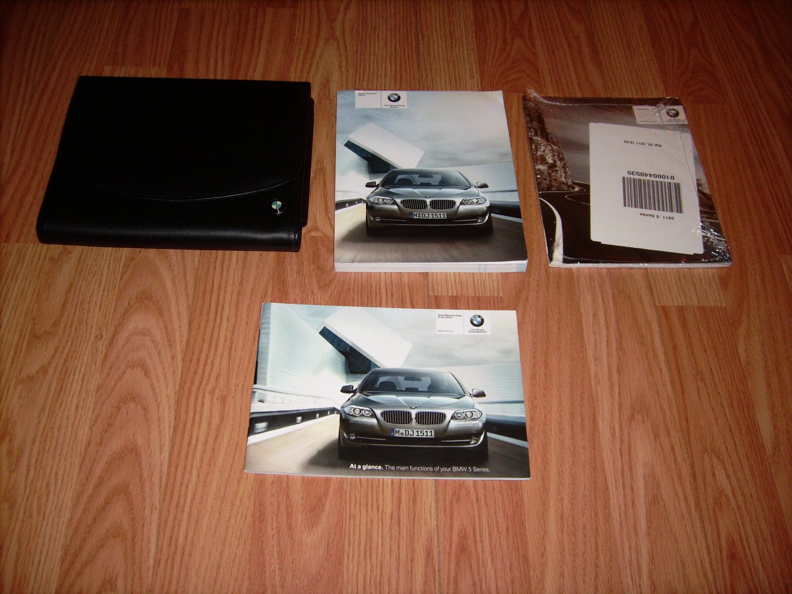 2011 BMW 528i 535i 550i 535i xDrive 550i xDrive Owners Manual with Nav.  Sec. Paperback – 2011