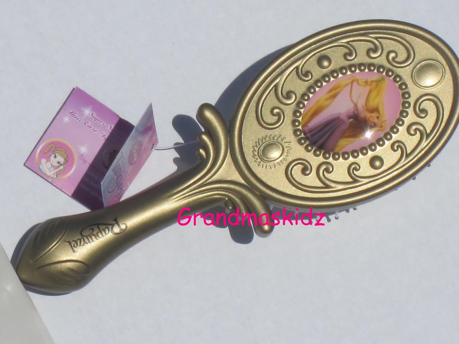 Disney's Tangled Movie Rapunzel's Gold hair Brush Amazon.co.uk Toys