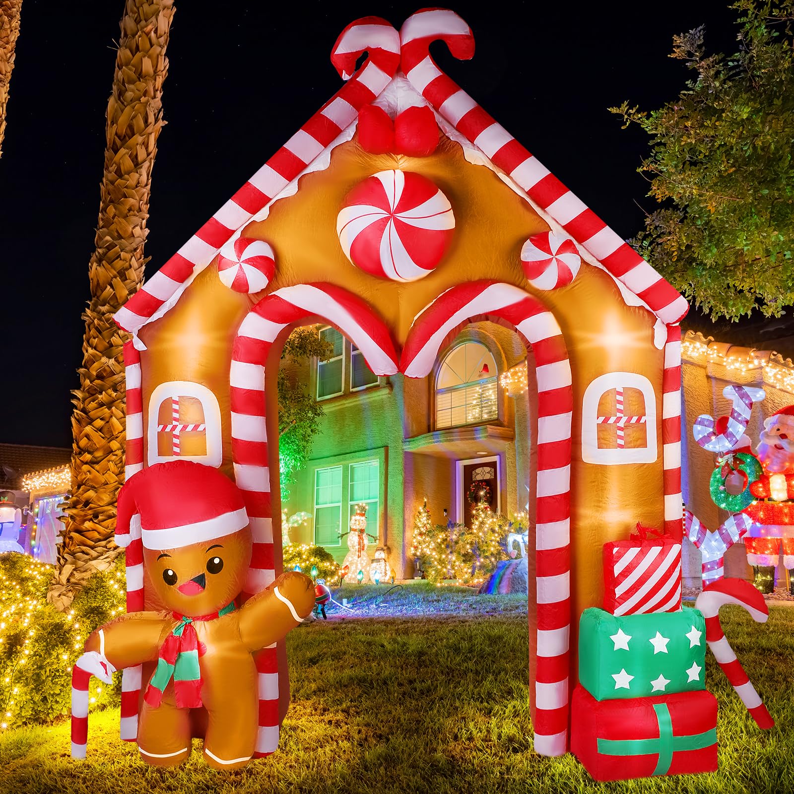 Photo 1 of ****WORKS/INFLATES WELL*****

Lenwen 10 ft Christmas Inflatable Gingerbread House Archway Gingerbread Man Cookie House and Candy Cane Decor with LED Lights Set for Christmas Party Indoor Outdoor Yard, Door Holiday Decorations