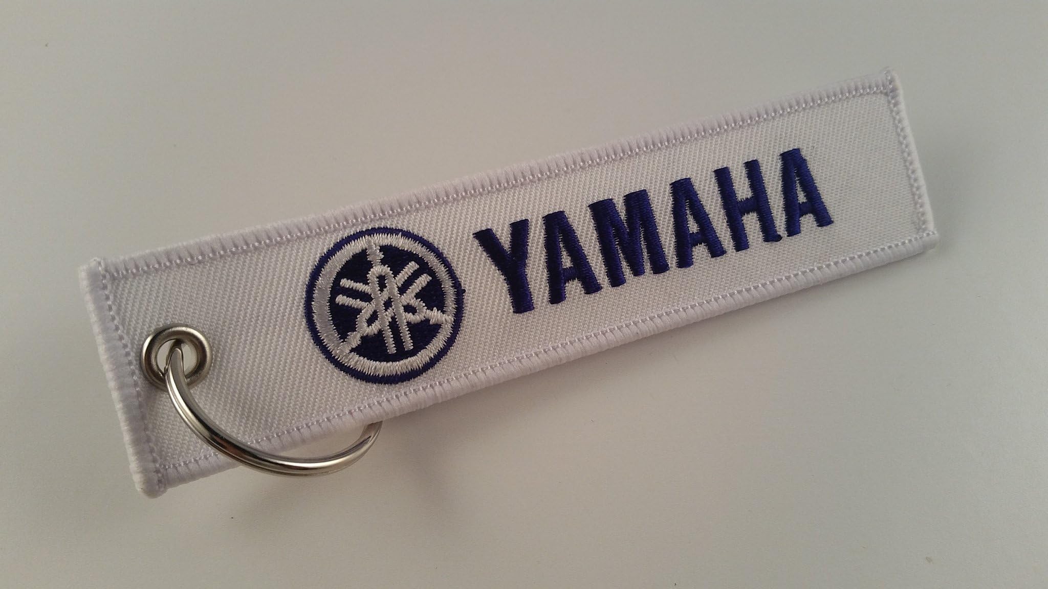 Yamaha Keyring in white with blue logo