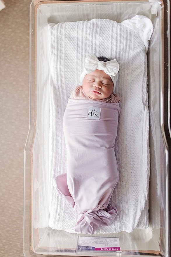 ollie swaddle with arms out