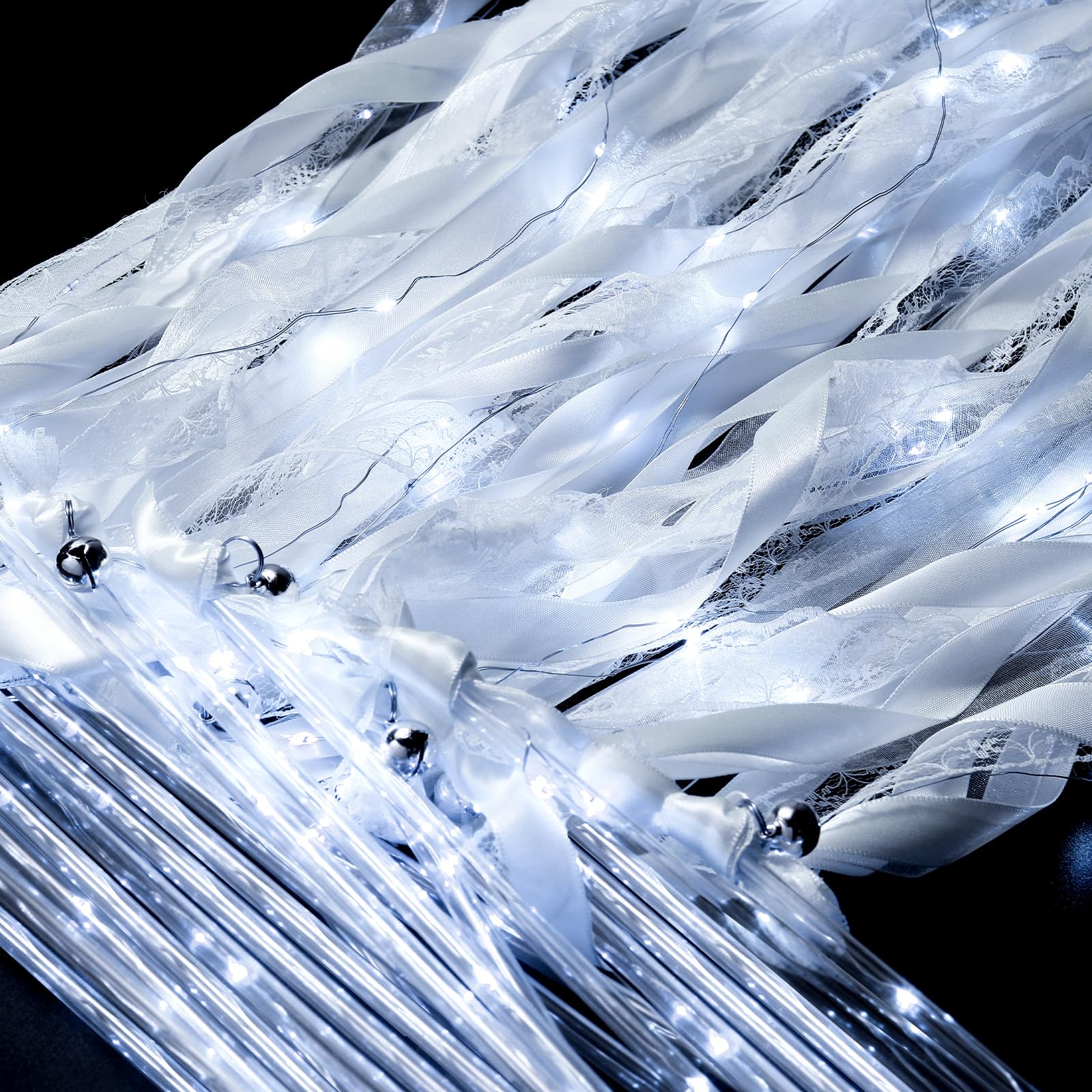 Photo 1 of HyDren 48 Pcs Wedding Wands Ribbon Streamers with Bells Fairy Light up Silk Fairy Wand Glow in The Dark Flashing Lace Stick for Wedding Birthday Party Favors (Ivory,Cool White)
