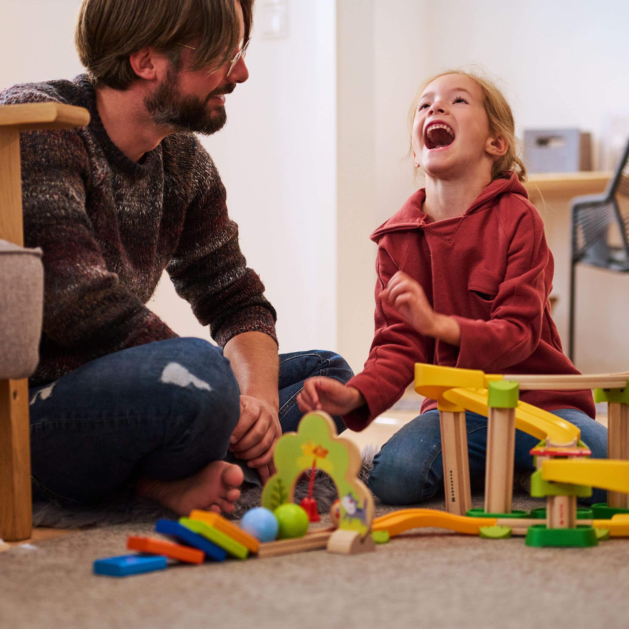 HABA Kullerbu Sim-Sala-Kling - 38 Piece Wooden & Plastic Train Track Set for Balls with Musical Effects and Domino Blocks