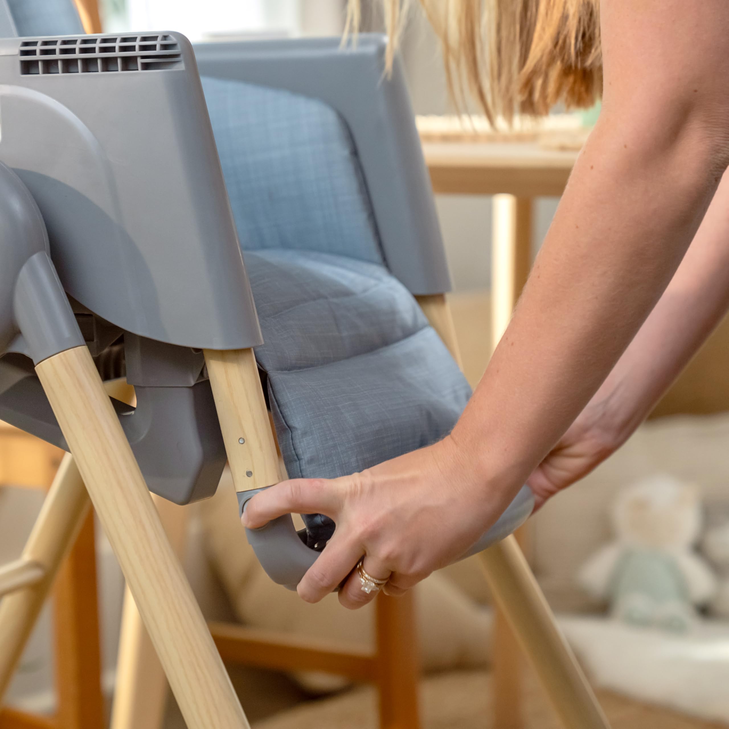Ingenuity Proper Positioner Deluxe High Chair - 7-in-1 Convertible Baby Seat, Faux Wood Print Legs, Unisex, for Ages 0-36 Months