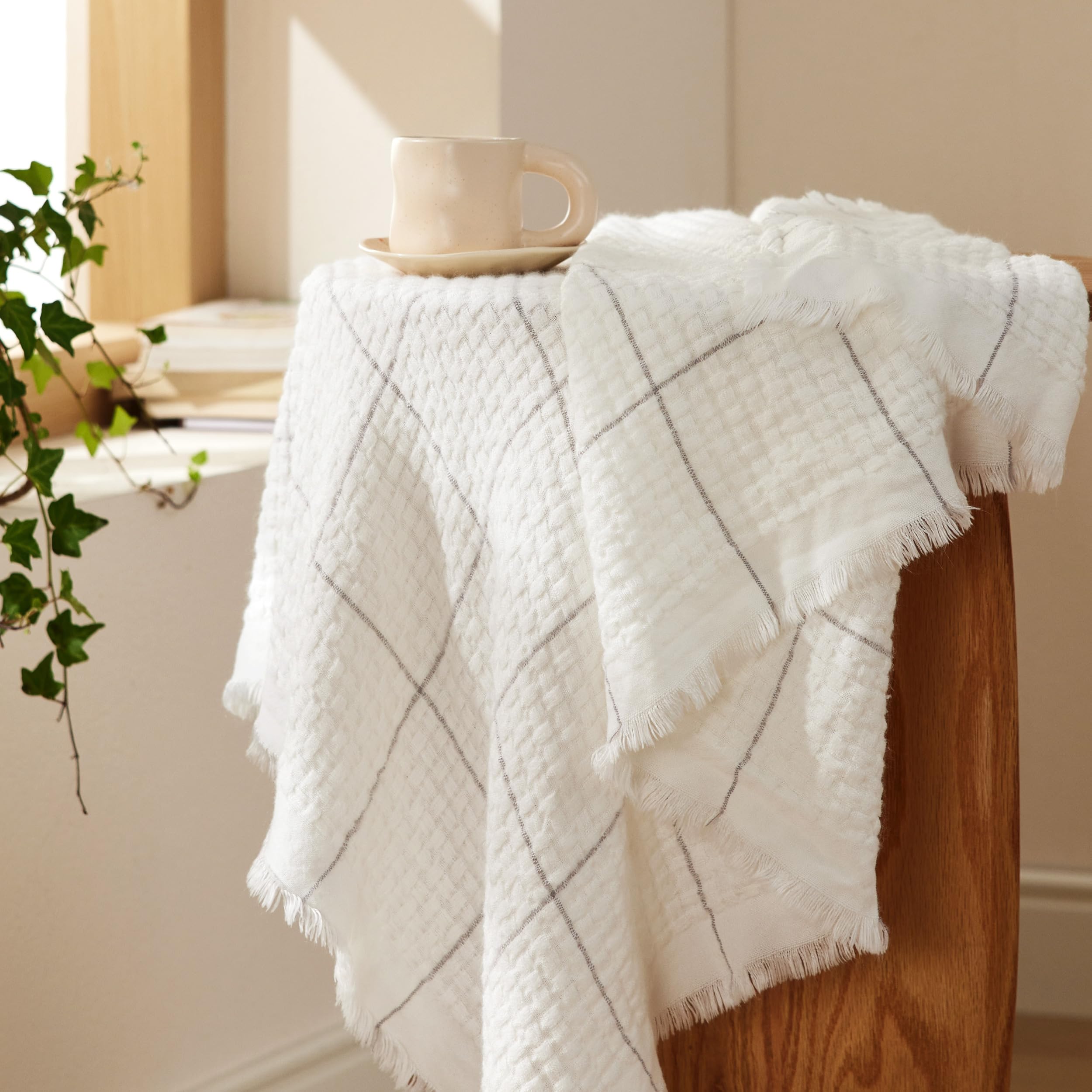 Photo 1 of Bedsure Cream Throw Blanket for Bed - White Decorative Woven Throw Gifts with Tassels, Soft and Lightweight Farmhouse Blankets for Couch and Sofa, 50x60 Inches