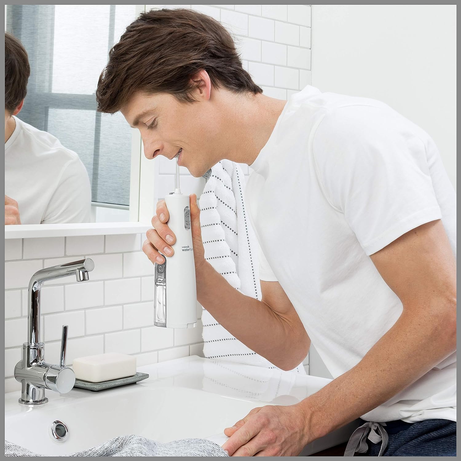 Waterpik Cordless Water Flosser, Battery Operated & Portable for Travel & Home, ADA Accepted Cordless Express, White WF-02: Beauty