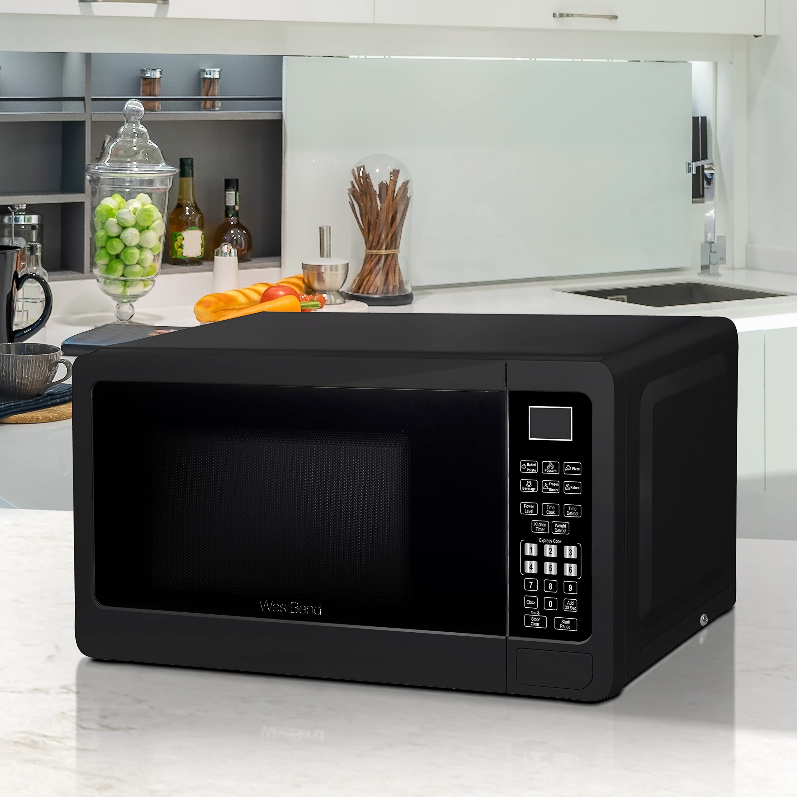 West Bend WBMW71B Microwave Oven 700-Watts Compact with 6 Pre Cooking Settings, Speed Defrost, Electronic Control Panel and Glass Turntable, 0.7-Cu.Ft, Black