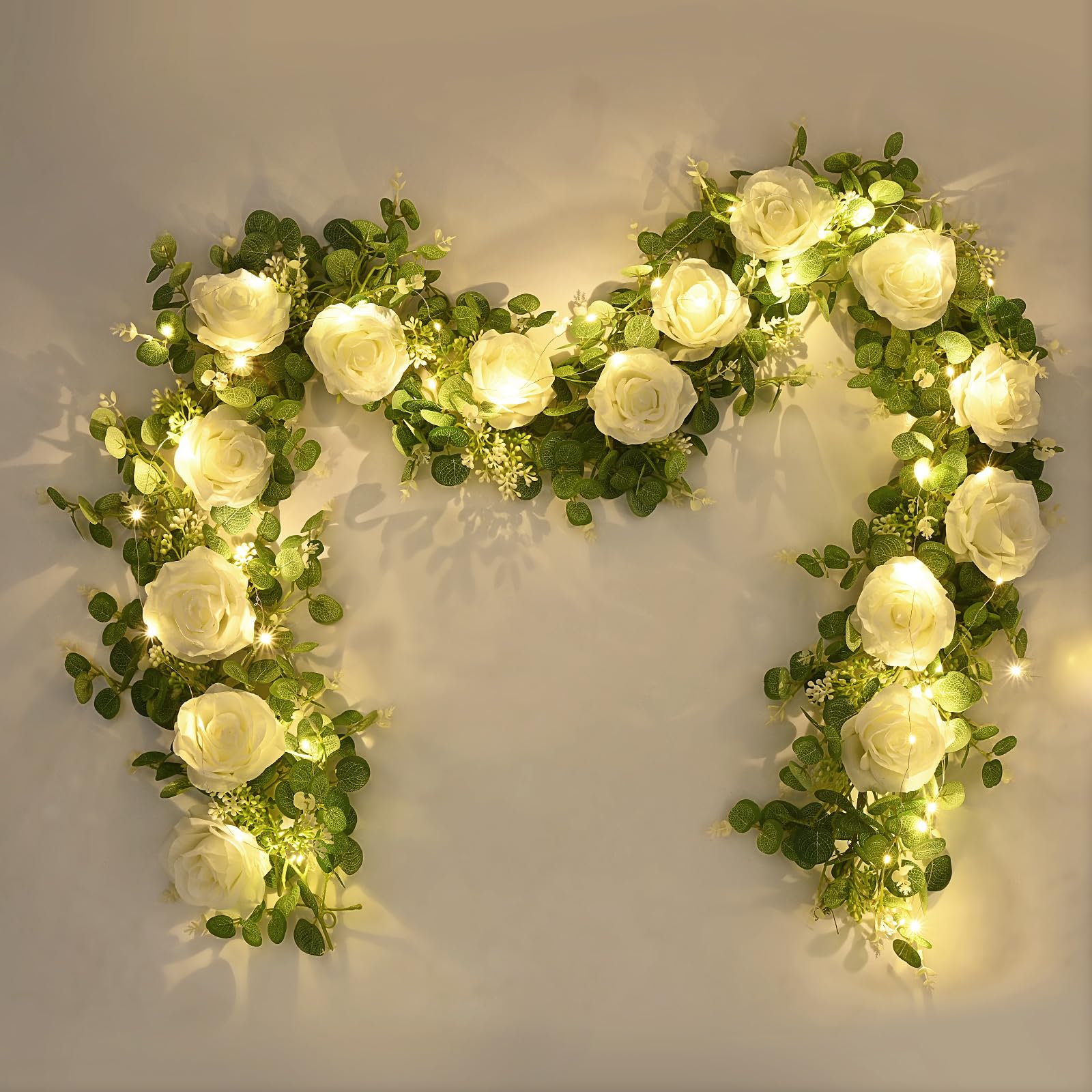 Photo 1 of **LIGHTS NOT INCLUDED** Dolicer 2Pcs 13Ft Artificial Eucalyptus Garlands with Flowers - 8 Roses, Faux Floral Greenery Garlands with 13Ft String Lights Fake Flower Vines for Wedding Table Centerpieces Arch Party Decor (White)