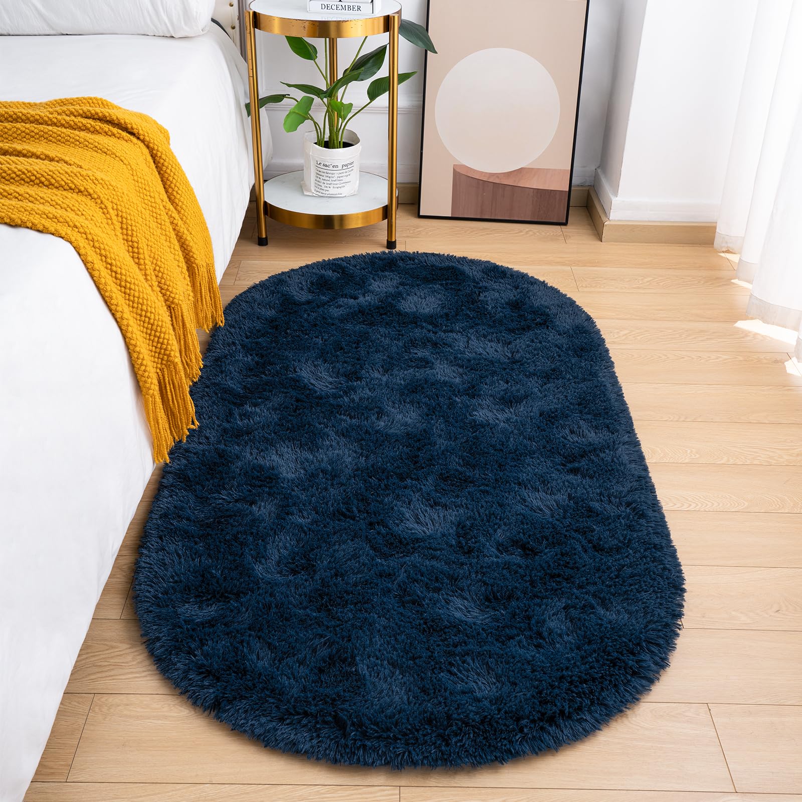 Photo 1 of Goideal Fluffy Bedroom Rug, Small Oval Area Rugs, Navy Blue Shag Bedside Carpet for Kids Room Nursery Dorm Cute Fuzzy Indoor Decor for Boy and Girl, 2.6 x 5.3 Feet