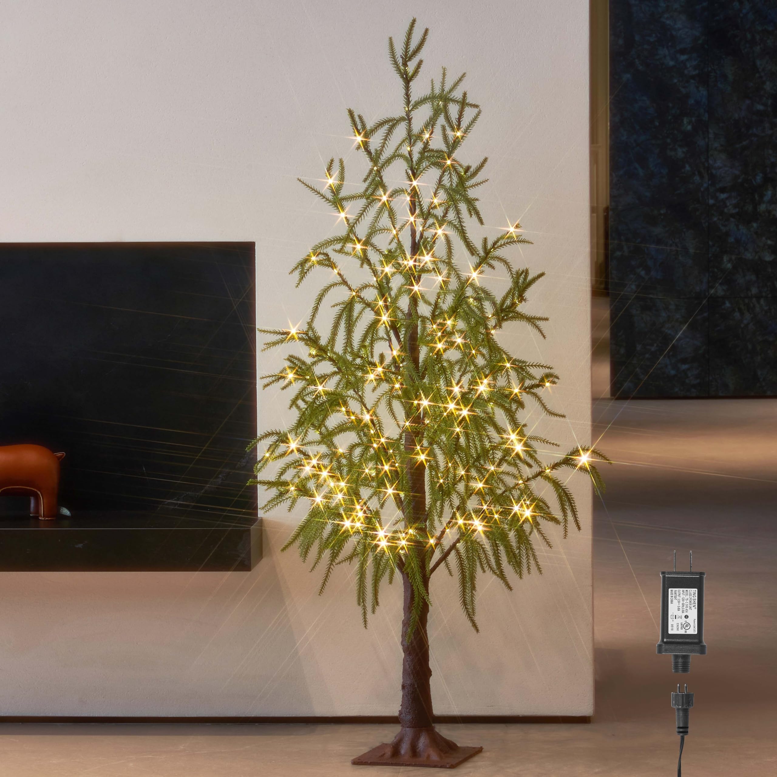 Photo 1 of LITBLOOM Lighted Norfolk Pine Tree 4FT 180 LED Fairy Lights, Christmas Tree with Lights for Home Holiday Decoration Indoor Outdoor