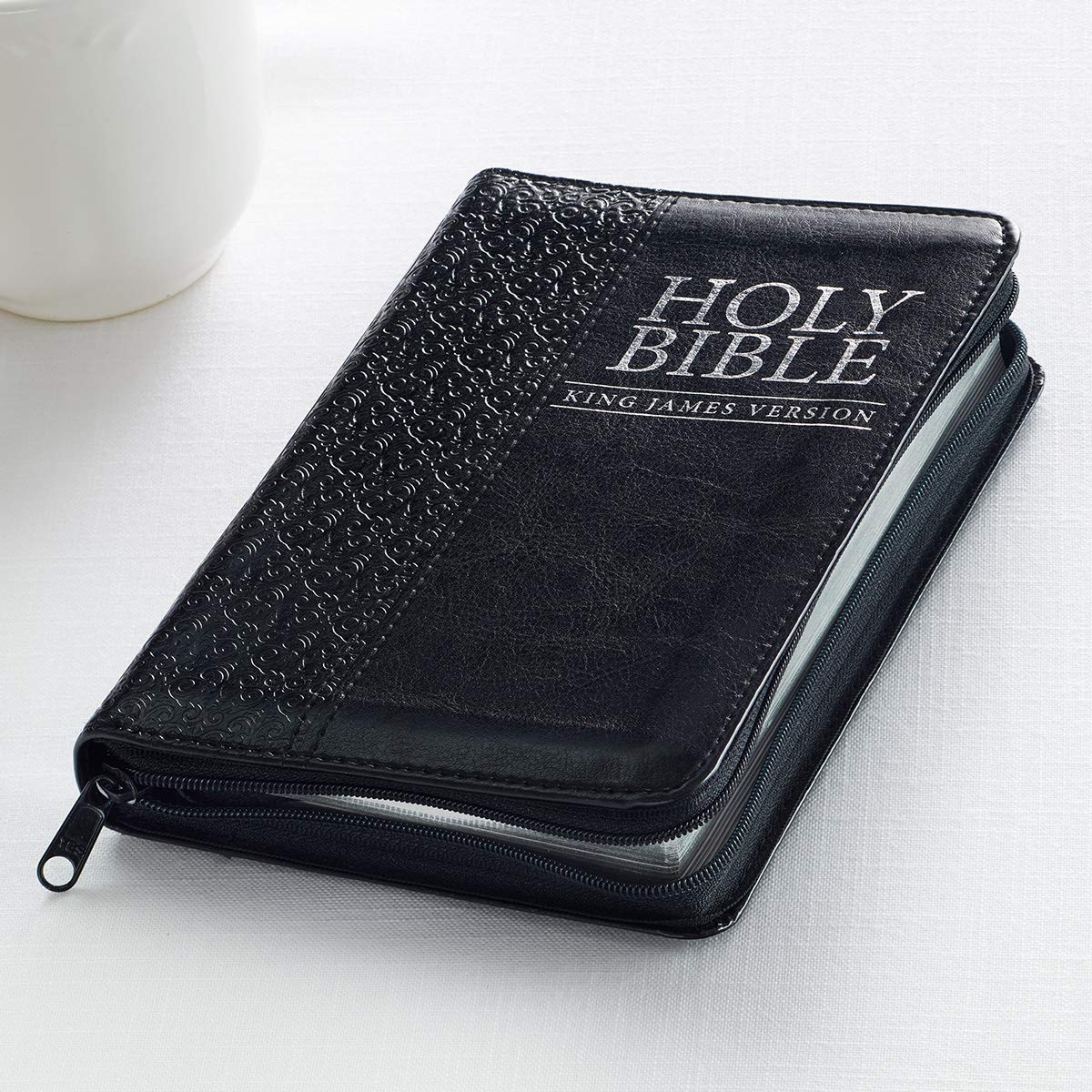 KJV Holy Bible, Compact Faux Leather Red Letter Edition - Ribbon Marker, King James Version, Black Faux Leather, Zipper Closure (KJV Compact Editions) KJV Holy Bible, Compact Faux Leather Red Letter Edition - Ribbon Marker, King James Version, Black Faux Leather, Zipper Closure (KJV Compact Editions) Imitation Leather
