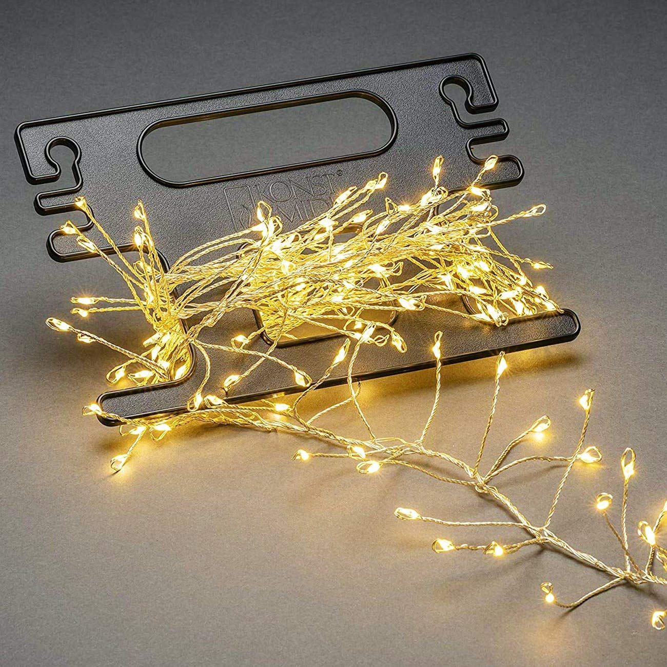 Konstsmide LED Naked Cluster Pin Chain/Outdoor Christmas Indoor Use (IP44)/Cable Reel Included/200 Amber White Diodes/Silver Wire String Lights, 3.6 W
