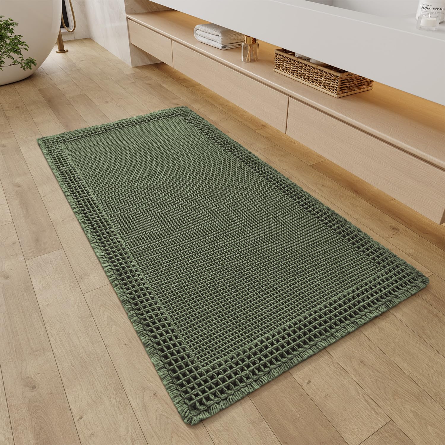 Photo 1 of RESARE Waffle Bathroom Runner Rugs, Super Absorbent Bath Mat Non Slip Washable Quick Dry, Upgraded Ultra Soft Boho Bath Rugs with Tassels for Hallway Bedroom Laundry Room, 2'x4'(24"x48"), Green
