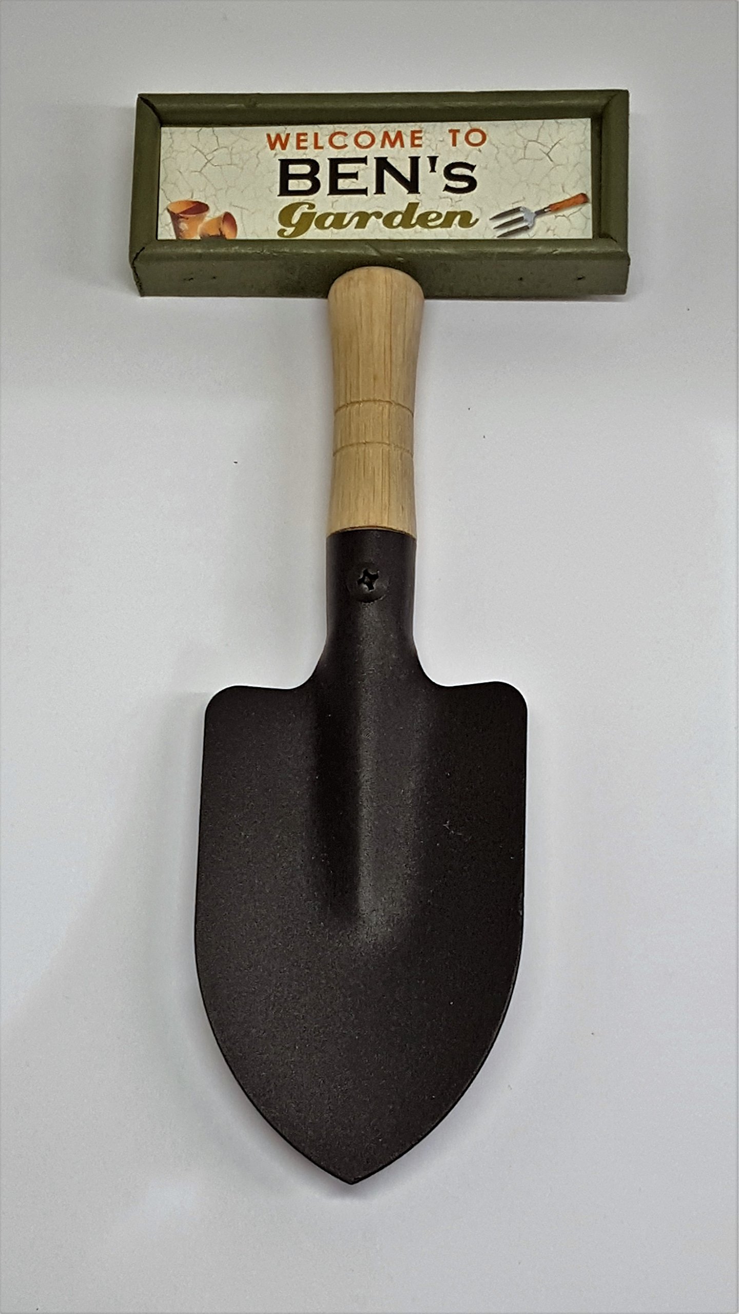 "Welcome to Ben's garden" hanging shovel sign