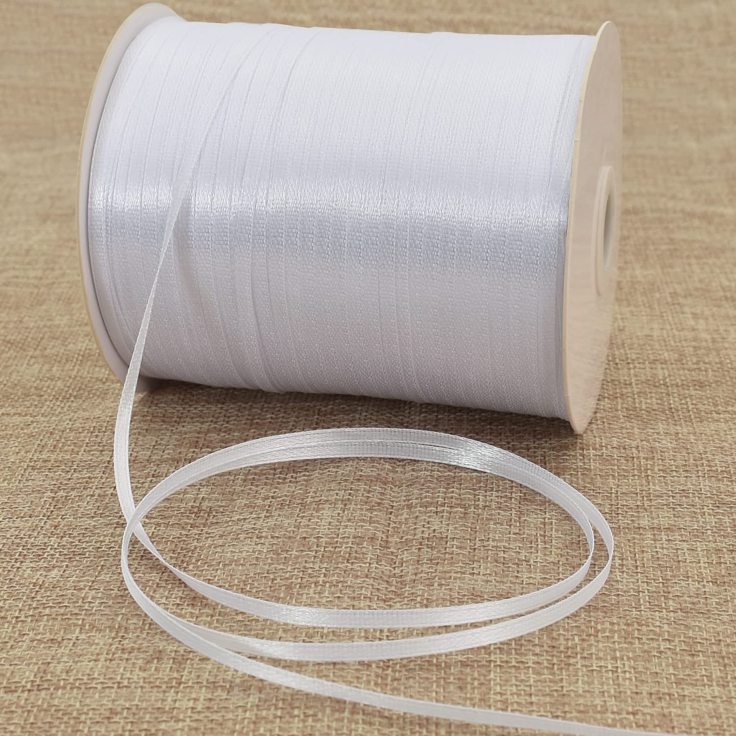 Photo 1 of 1/8 Inch x 870 Yards White Thin Solid Satin Ribbon Giant Spool Double Face Woven Polyester Fabric Ribbons for Crafts Hanging Tags Invitation Card Balloons Bouquet Hair Gift Wrapping Party Decoration