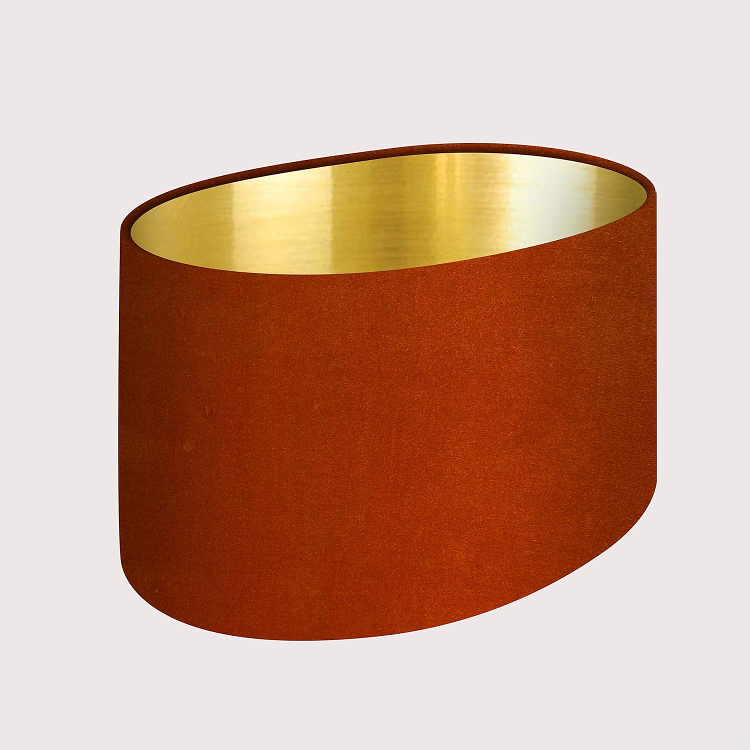 Oval Burnt Orange Velvet Fabric with a Brushed Gold Metallic Lining