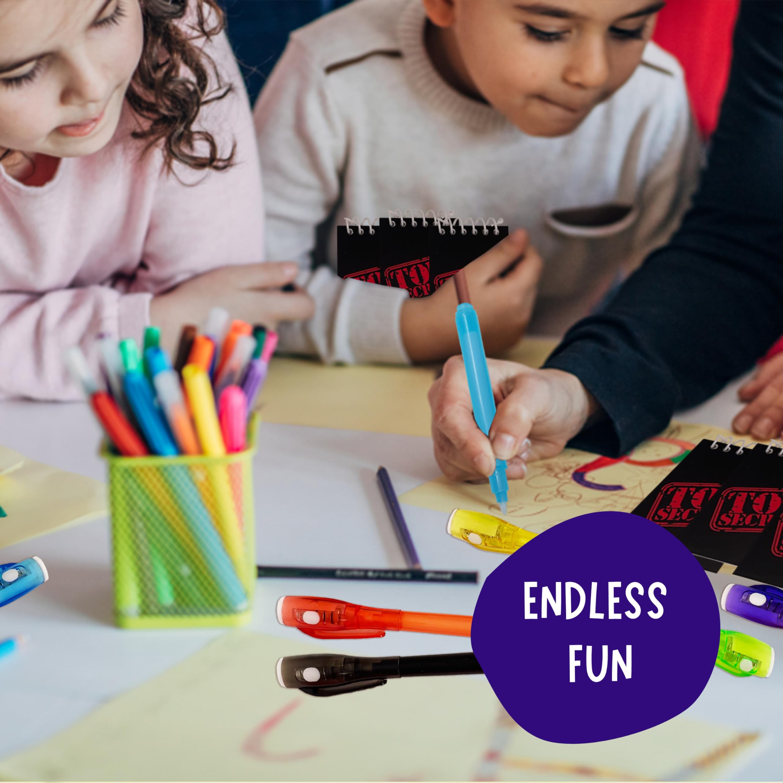 4E's Novelty 12 Invisible Ink Pen with UV Light, 12 Mini Top Secret Notebook and 12 White Goodie Bags - Fun Bulk Party Favors for Kids