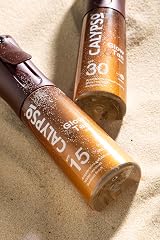Calypso Glow Tan Mist SPF 30 Bronzing Tan Enhancer Oil Accelerator Water view 9