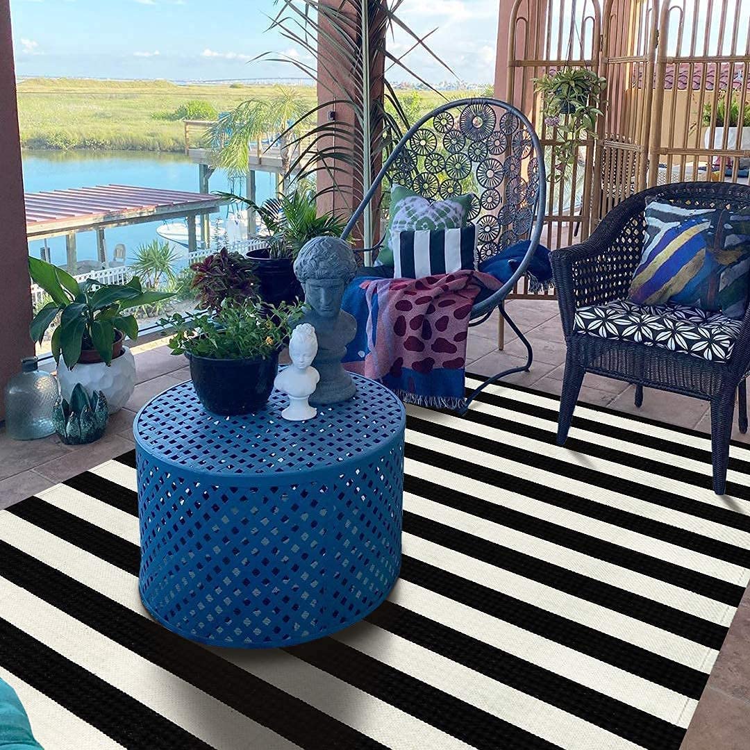 Photo 1 of Seavish Black and White Rug, 5x8 ft Outdoor Patio Rugs, Handmade Cotton Woven Farmhouse Christmas Halloween Decor Rug, Machine Washable Carpet Rugs for Living Room Entryway Home Office Dining Room