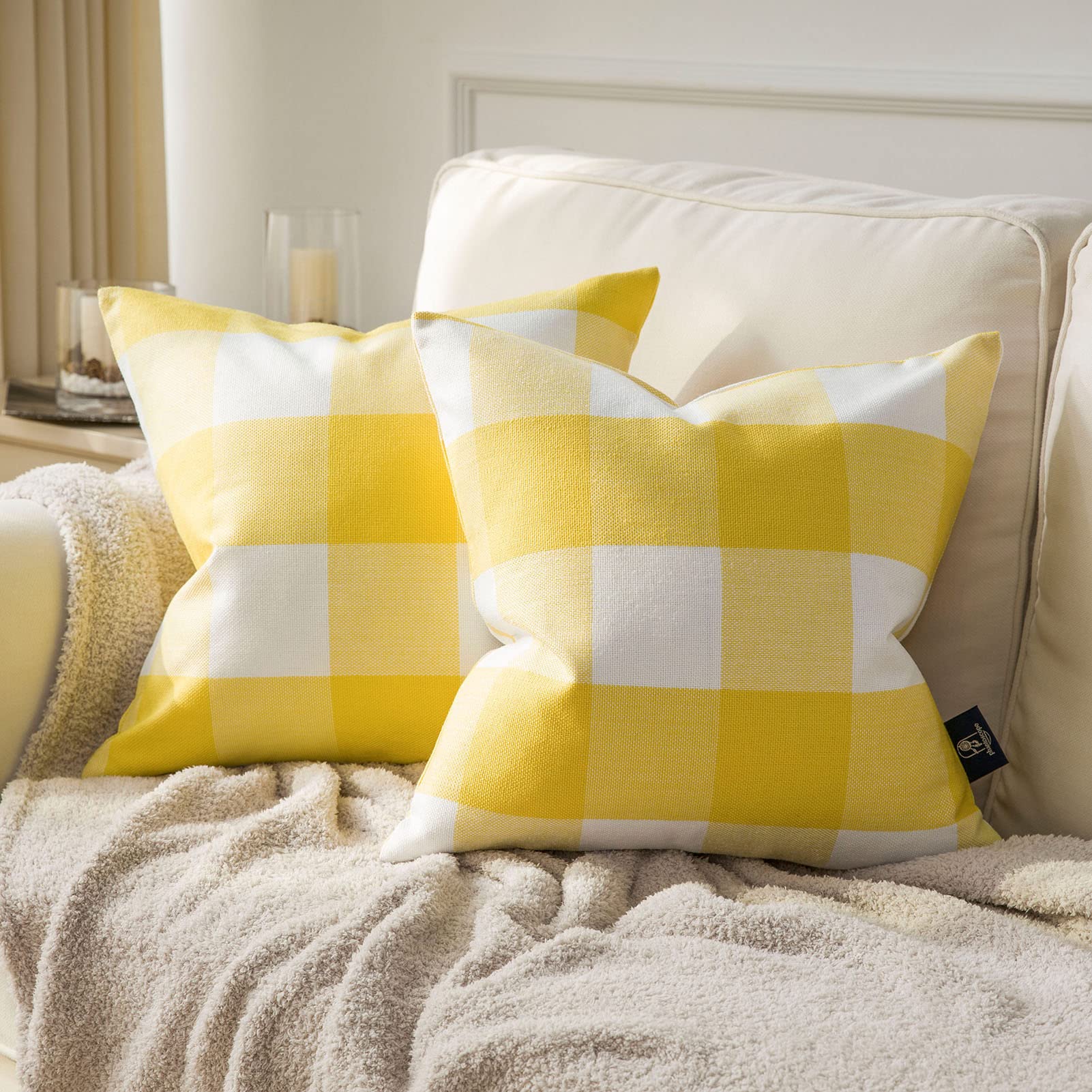 Photo 1 of (used/fair) Phantoscope Pack of 2 Gingham Buffalo Check Plaid Throw Decorative Pillow Cover Outdoor Indoor Throw Pillows Farmhouse Square Pillow Cases for Home Decor Yellow,20 x 20 Inches