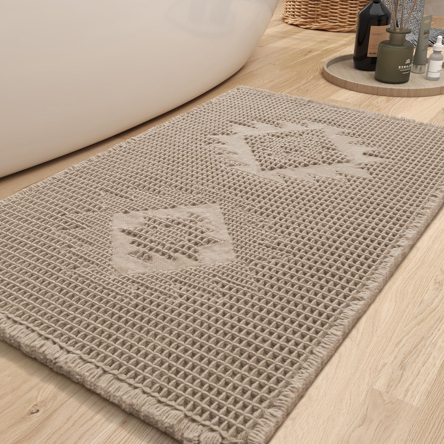 Photo 1 of COCOER Waffle Bath Mat, Super Absorbent Bath Mats for Bathroom Floor, Machine Washable Non Slip Bathroom Rug with Tassels, Soft Bathroom Mat for Laundry Room, Bedroom, Brown 17" x 24"