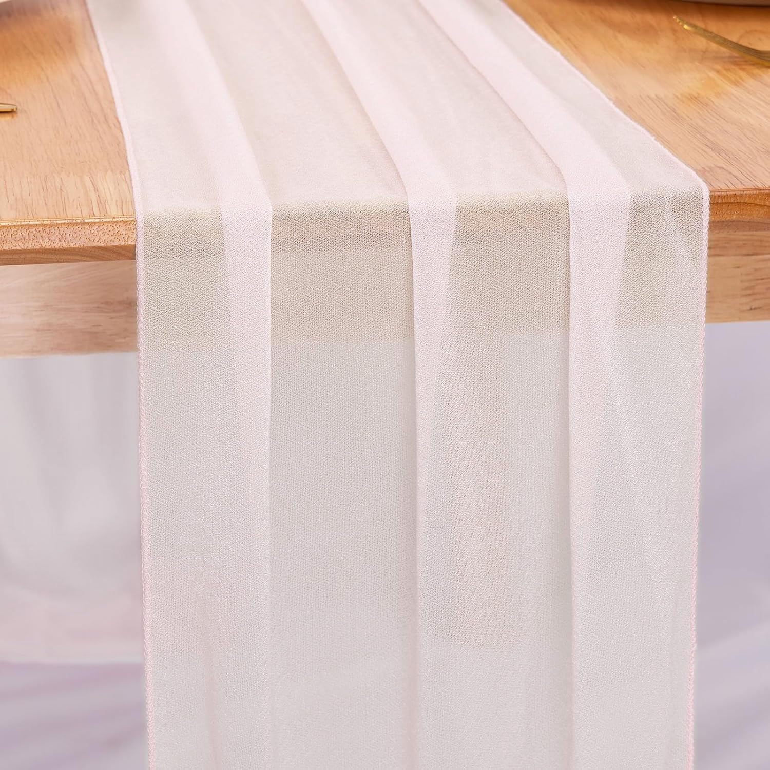 Photo 1 of RuiYok Ivory Chiffon Table Runners 10 FT Chiffon Cloth Runner for Wedding Party 12 x 120 Inches Sheer Boho Rustic Gauze Home Decor Restaurant Elegant Fabric Tabletop Runner Decorations