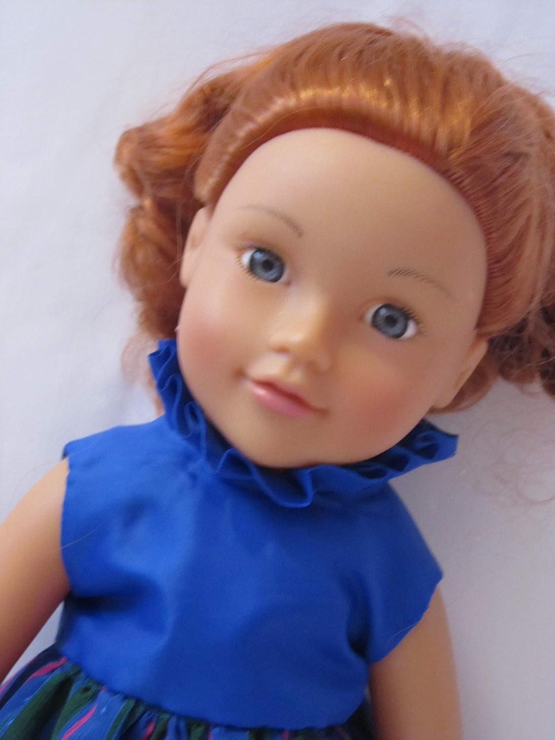 Dollies Boutique Blue party dress with black ‘fur’ wrap and sparkly