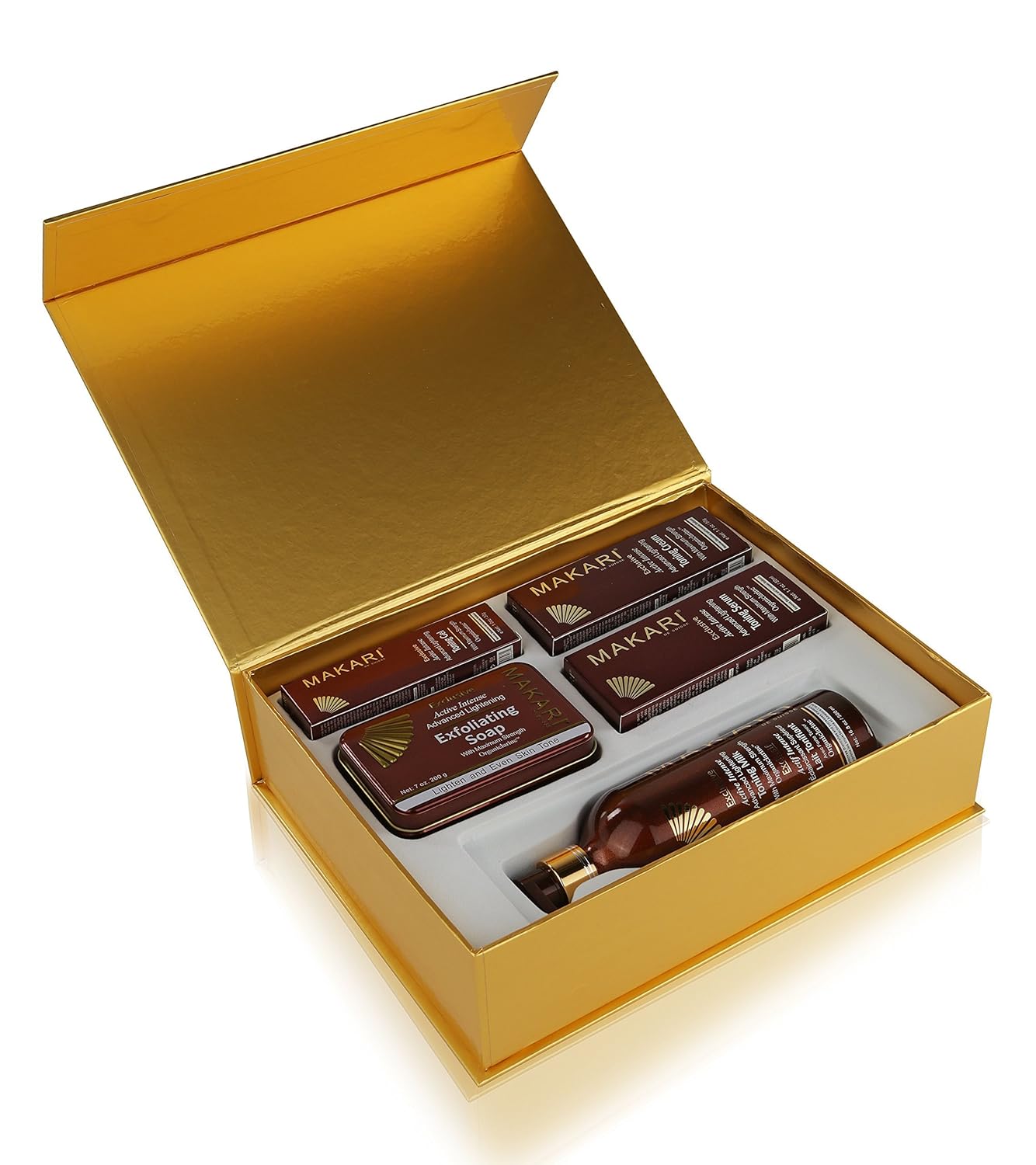 Makari Exclusive Skin Toning Gift Set – Complete Skin Lightening, Brightening & Toning Regimen with 16.8oz Toning Milk, 1.7oz Cream, 1.7oz Serum, 1oz Gel, 7oz. Exfoliating Soap & Decorative Gift Box