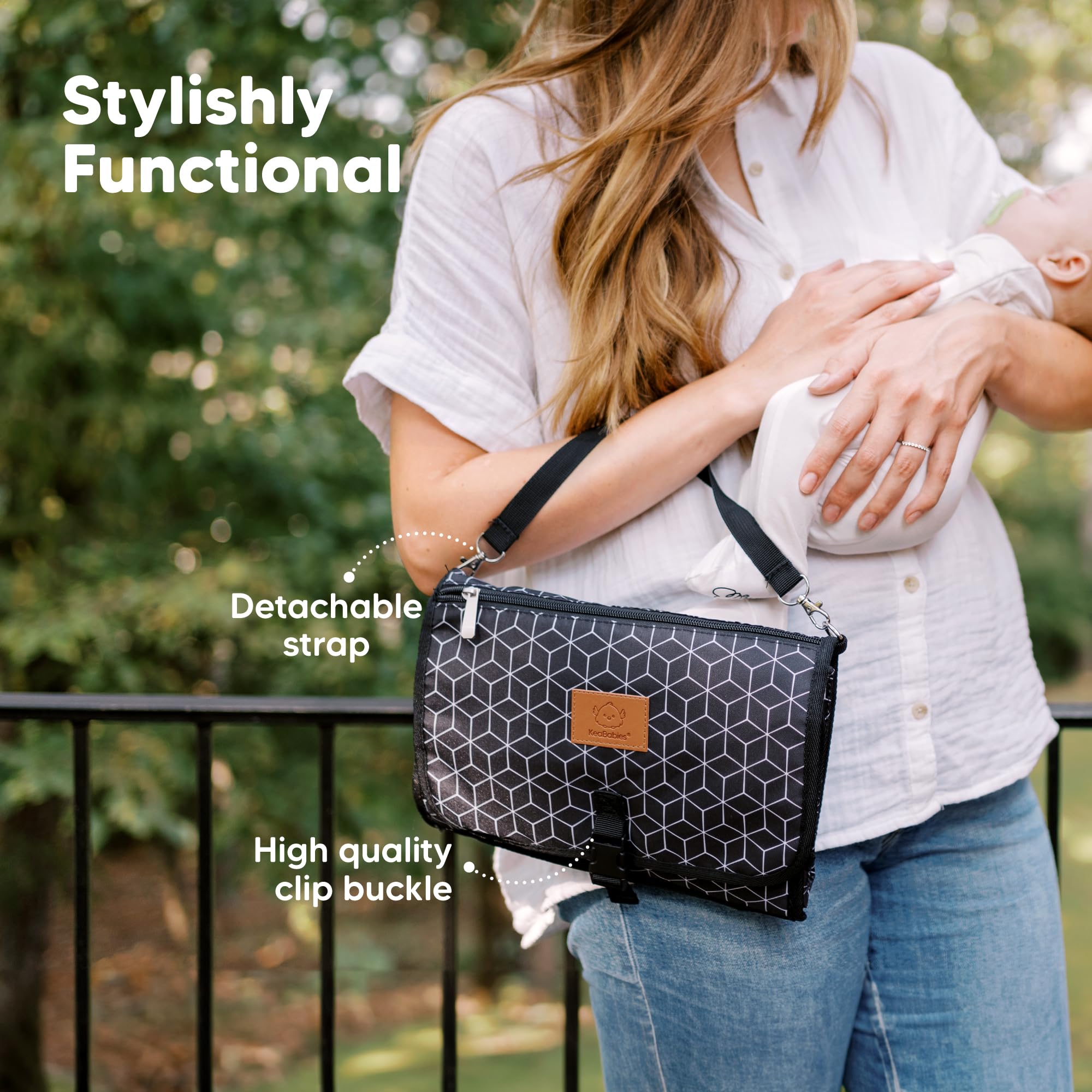KeaBabies Portable Diaper Changing Pad - Large Waterproof Baby Changing Mat, Compact Travel Diaper Clutch, Functional Pockets Fit Newborn Essentials, Wipeable & Padded Baby Changer (Black Geo)