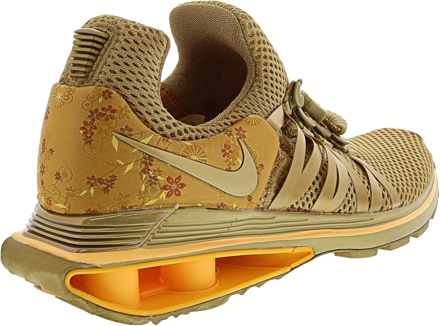 nike shox gravity women's gold