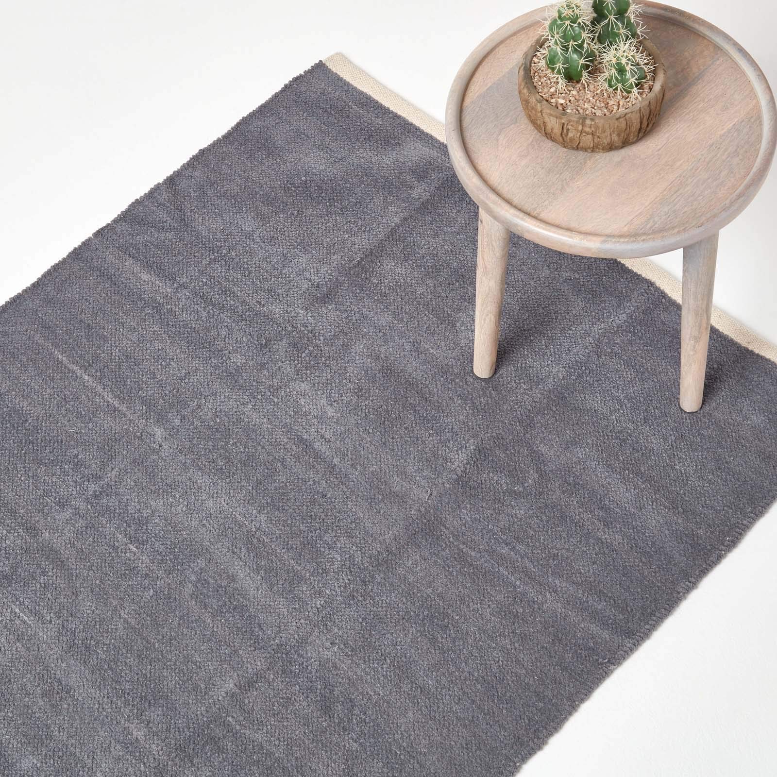 HOMESCAPES Dark Grey Rug 100% Cotton Plain Modern Reversible Chenille Floor Mat with Natural Colour Trim Anti Shedding Soft Touch Washable, Medium, 60 x 100 cm (24" x 39") โ image 1