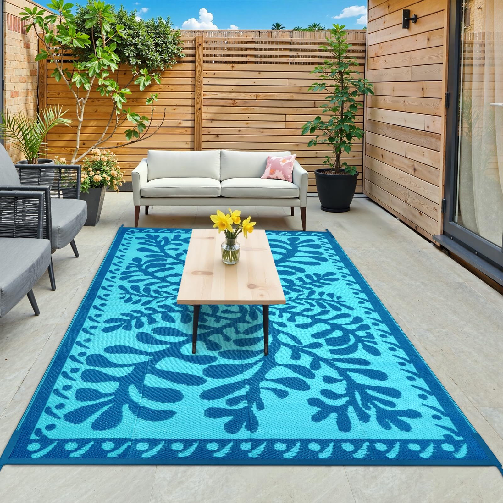 Photo 1 of Anidaroel Outdoor Area Rug for Patio Clearance 6x9 Waterproof, Reversible Plastic Straw Rug Outside Rug, RV Mat for Camping, Porch, Balcony, Pool Deck, Backyard (Blue,6’x9’)