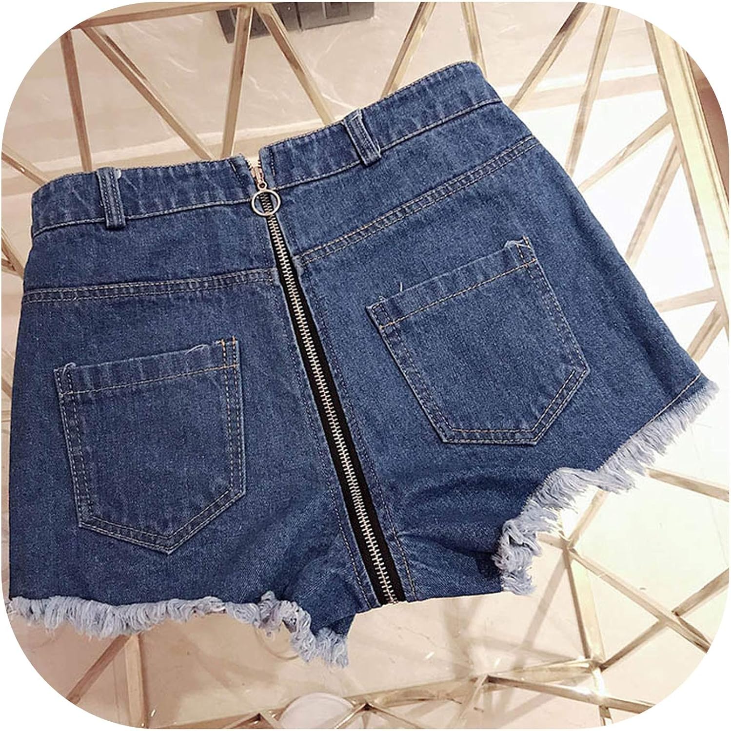 ripped shorts in the back